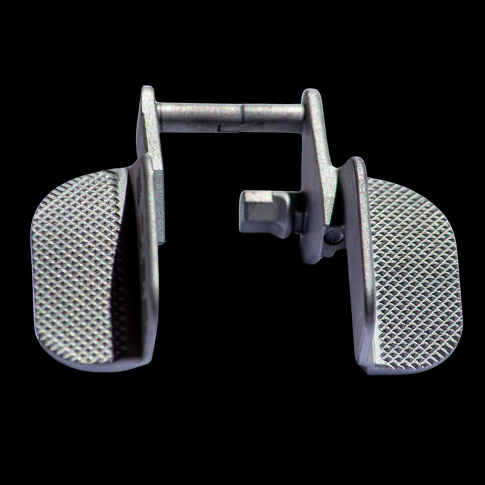 Extra wide one-piece CNC ambidextrous thumb safeties with slide clearance shields for 2011 guns