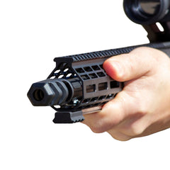 QPQ-finished 416 stainless .223 muzzle brake with 1/2x28 threading — close-up detail