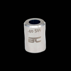.40 Cal case gauge with a reloaded round seated flush, confirming correct case dimensions