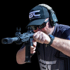Extended machined charging handle for Berika 12g shotguns — angled view