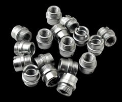 Stainless steel 1911 hex grip screw and bushing set — close-up detail
