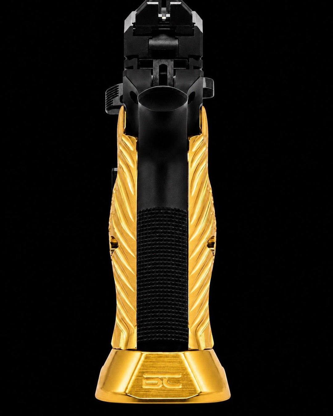CZ Shadow 2 brass magwell fitted to the frame with matching brass grips installed