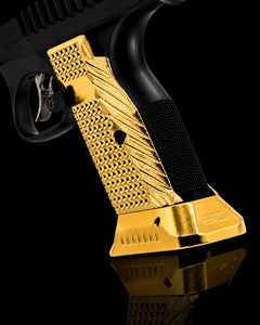CZ Shadow 2 brass magwell paired with matching brass palm swell grips as a weight bundle