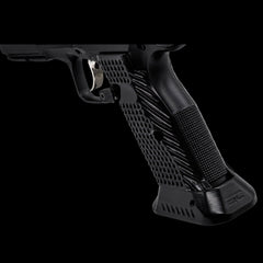 CZ Shadow 2 magwell-cut brass grips fitted to a competition pistol frame, gold finish
