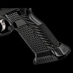 CZ Shadow 2 brass magwell-cut grips shown edge-on, highlighting panel thickness and weight