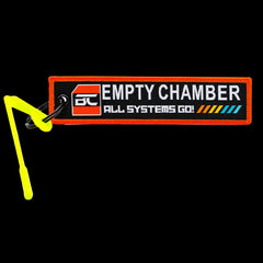 High-visibility centrefire chamber safety flag, empty chamber indicator — reverse side view